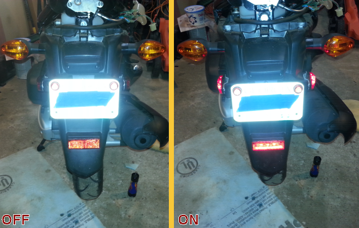 Here's the running lights installed, in a split-image to show what they look like both on and off. I had all the lights on in the lair, the overhead, and two additional floodlights, so they don't look very bright. In retrospect, I should have covered the plate completely so it wouldn't reflect so much of the flash.