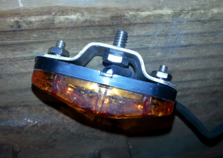 This is what the new brackets look like when mounted to the running lights.