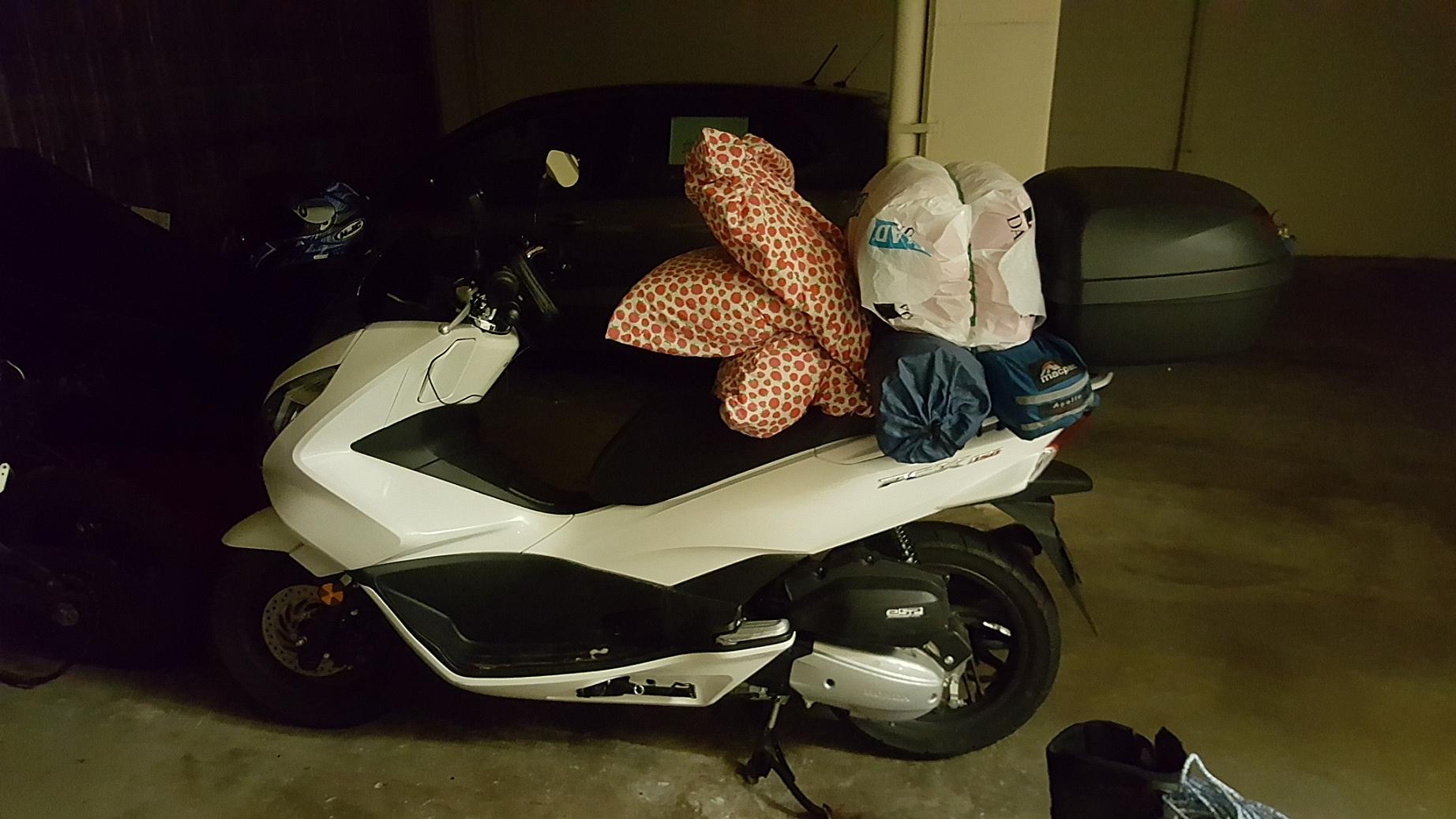 pcx carrying a few camping things