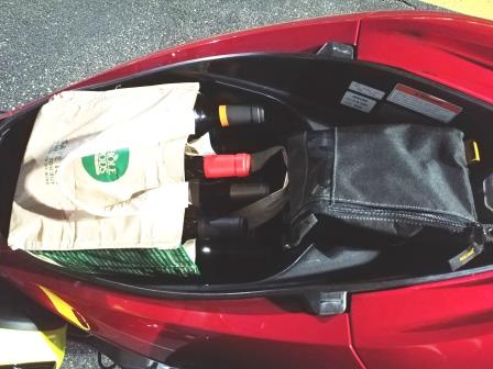 A &quot;6-pack&quot; of wine is a perfect fit under the PCX seat!