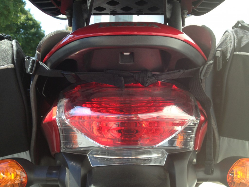looped clips above tail light