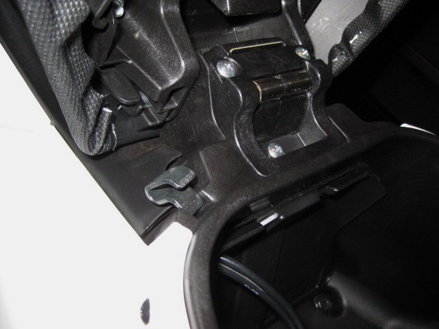 &quot;PCX&quot; <br />helmet hook found under Front of seat. Mini cable w/loop ends provided by Honda inside mini tool kit.