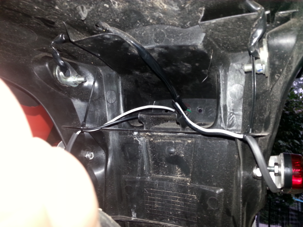 Here's how I ran the wires under the rear fender. I found some 5&quot; long zip ties in the Lair, and used them to secure the wiring.