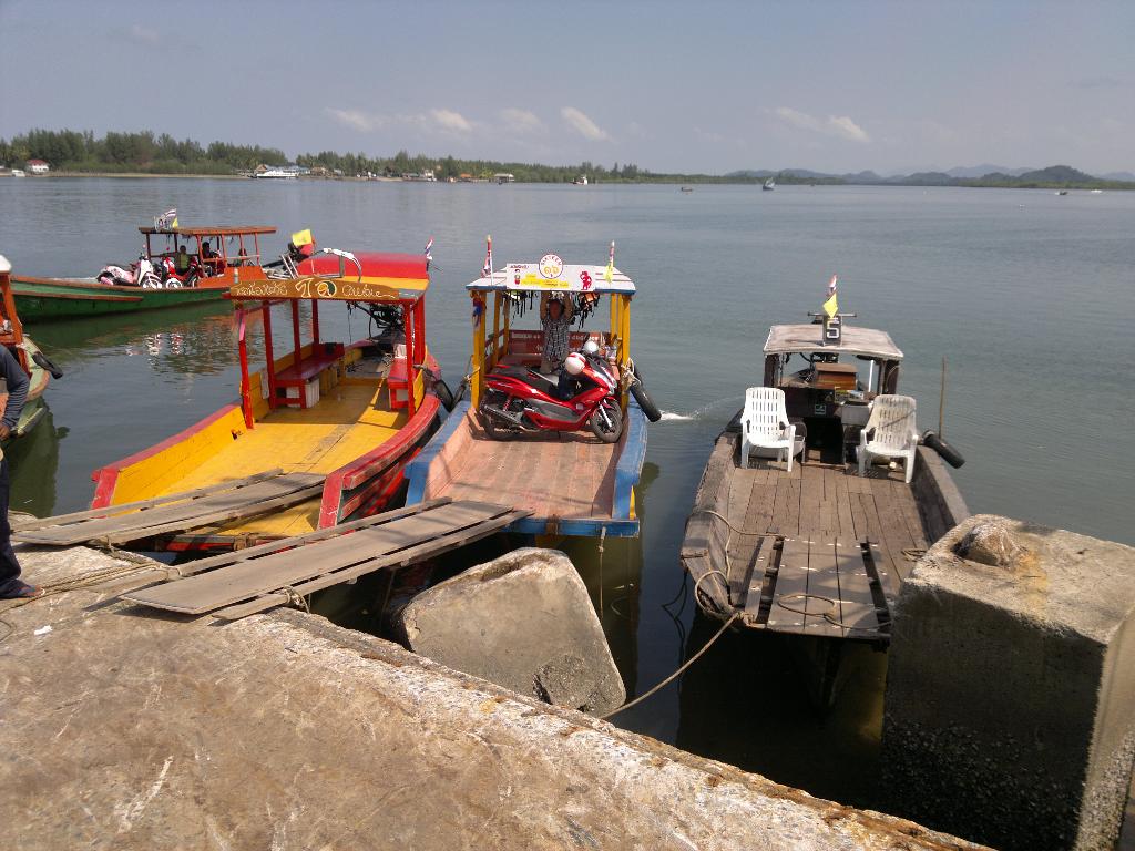 Adventurous ferry from mainland to the island near Takuapa