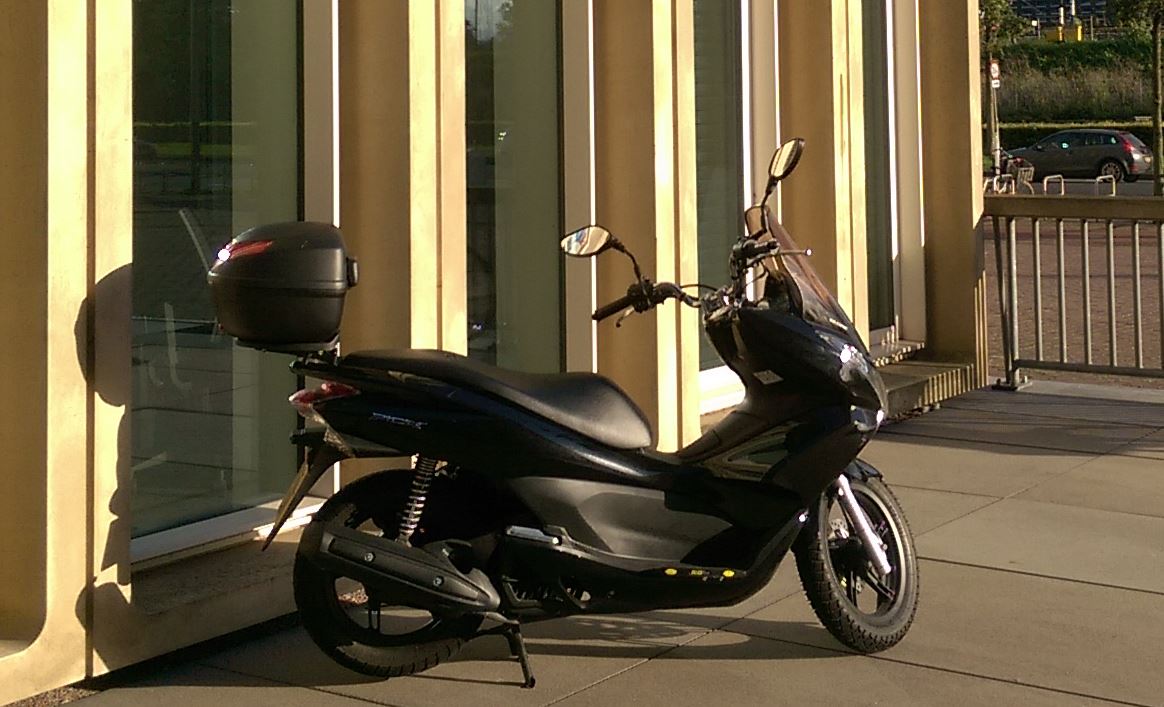 Sharp looking PCX in Amsterdam.JPG