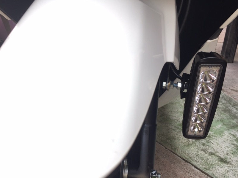 Mounted to reflector mount.